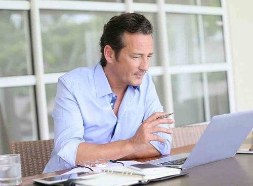 Life Insurance Options 2 2025 - man working at computer